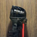 Suzuki 115 HP EFI outboard engine.