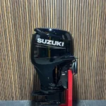 Suzuki 70 HP EFI outboard engine.